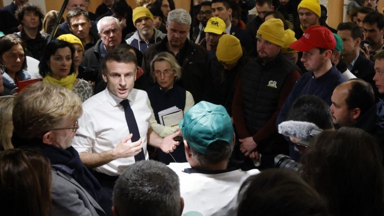 a farmer calls out Emmanuel Macron on suicides during a debate at the Agricultural Show