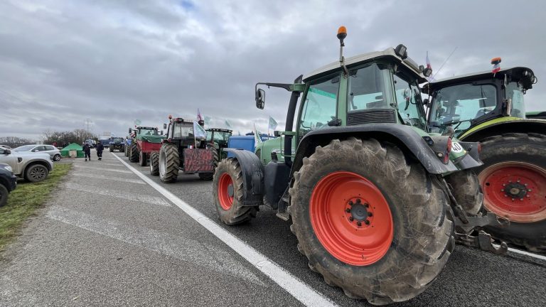 around fifty tractors and trucks gathered in Paris