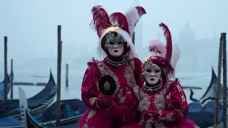 the French take off their masks at the Venice Carnival