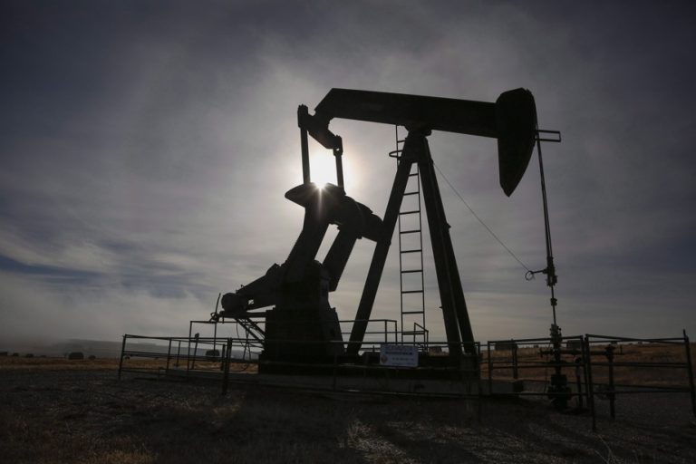 Oil weakens with profit taking