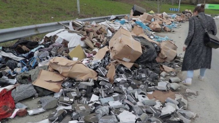 a highway ramp that has become an open-air landfill