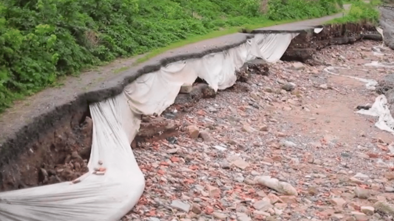 a landfill resurfaces after storms