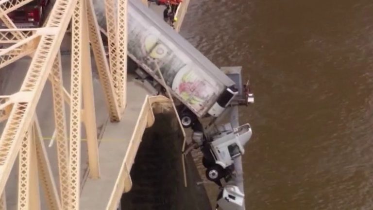 a truck remains suspended above the void in Kentucky