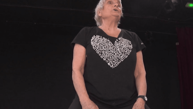 an 89-year-old gymnastics teacher gives classes for the elderly