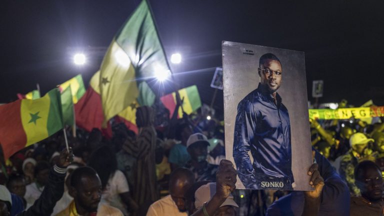 an excited youth at the final meeting of the anti-system candidate, Bassirou Diomaye Faye