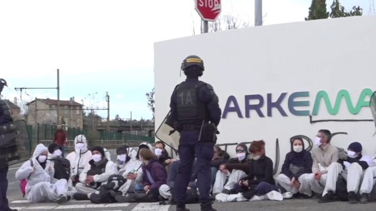 climate activists enter an Arkema factory