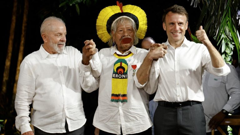 in the Amazon, Raoni makes the two heads of state smile despite their differences