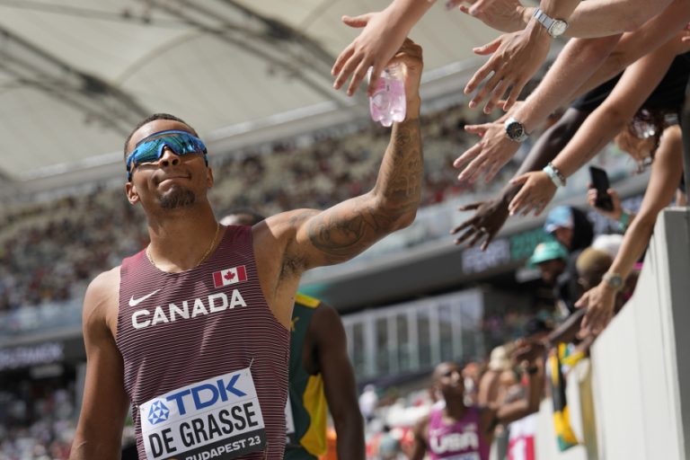 Andre De Grasse wins the 100 meters at the East Coast Relays