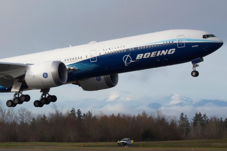 Boeing posts smaller loss than expected