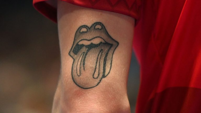 Explain the Rolling Stones “tongue” logo to us