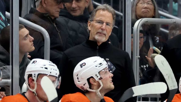 Knocked down by the Canadian, the Flyers players all had to stay in the locker room