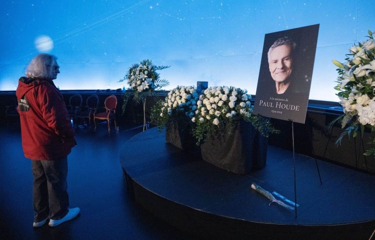 Last tributes to Paul Houde during a funeral service at the Montreal Planetarium