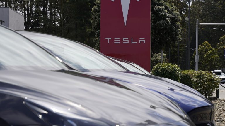 Tesla lays off nearly 14,000 people worldwide