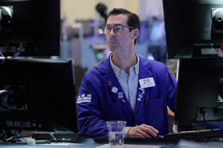 Wall Street opens lower, earnings season begins