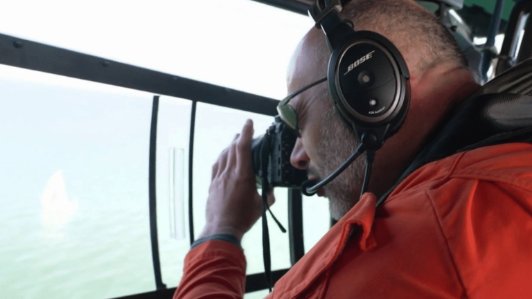 customs officers track ships on the open sea