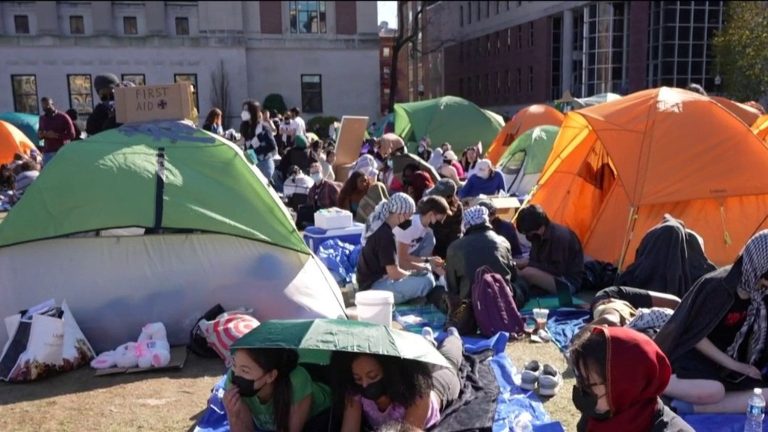 pro-Palestinian students set up tents in front of a campus