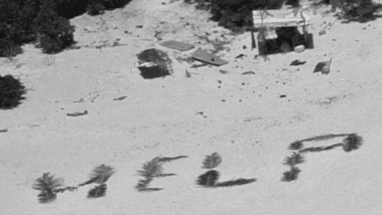 sailors saved by a giant message on a beach