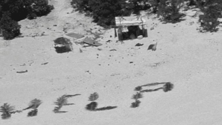 stranded on an island, sailors saved by their message on the beach