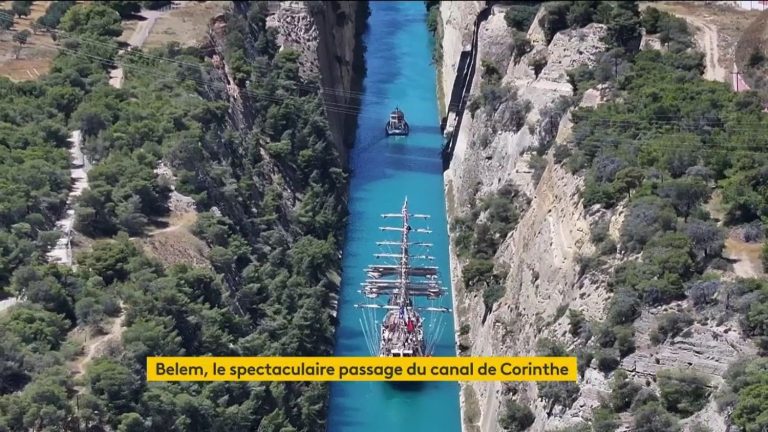 the breathtaking passage of the Olympic flame through the Corinth Canal