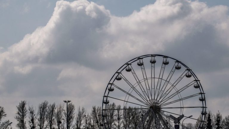 two men in police custody after the death of a fairground worker at the Easter fair