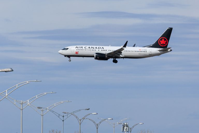 Air Canada suspends new seat selection fees