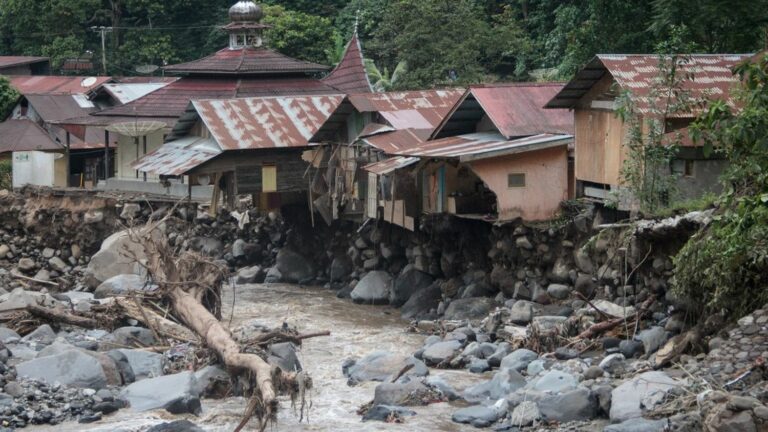 Floods and cold lava flows in Indonesia kill at least 34 people