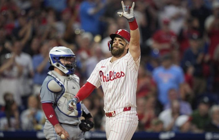 Harper hits a grand slam and the Phillies crush the Blue Jays 10-1