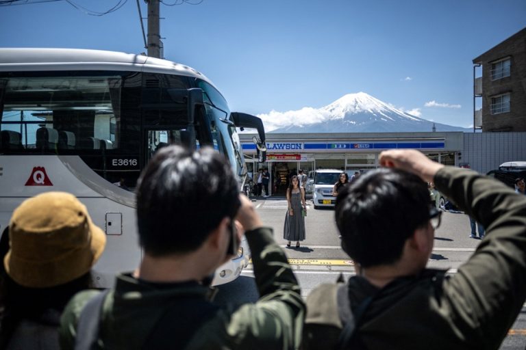 Japan |  Construction begins on a net to hide a view of Mount Fuji