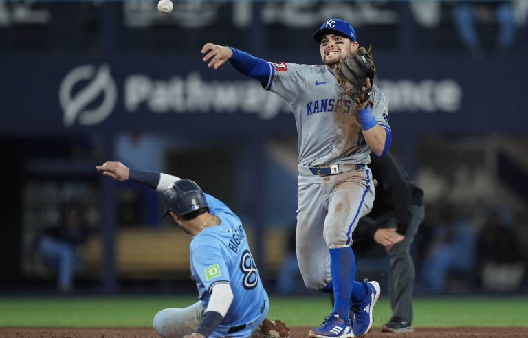 Michael Massey and the Kansas City Royals beat the Blue Jays in Toronto, 4-1