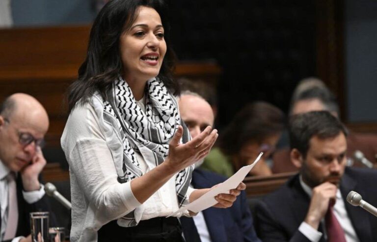 QS MP Ruba Ghazal, wearing a keffiyeh, calls for the closure of the Quebec office in Israel