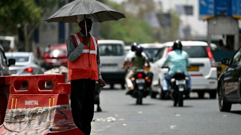 a record temperature of 52.3°C recorded in New Delhi, a record for the country