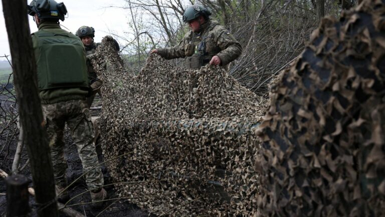 in Ukraine, residents of Kharkiv make camouflage nets