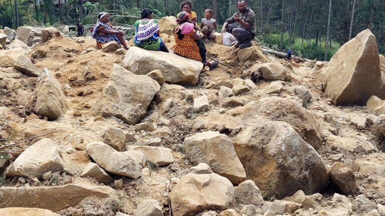 more than 2,000 people were buried in a landslide, according to a new report from the authorities