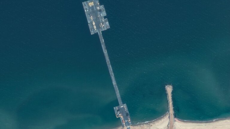 American pier to be moved to shelter during rough seas