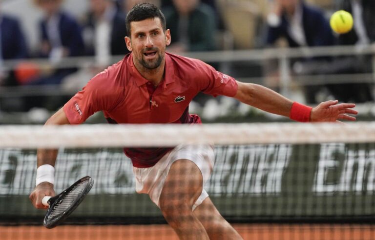 Djokovic overcomes Cerundolo and sets new Grand Slam record