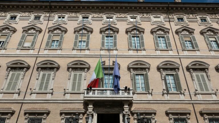 Parliamentarians fight in the Italian Chamber of Deputies