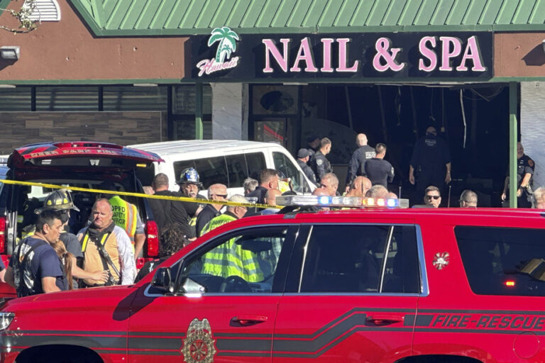 Truck hits nail salon, 4 dead, 9 injured