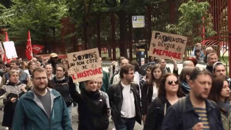 tens of thousands of people marched throughout France