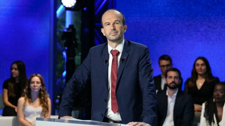 what does the red triangle worn by Manuel Bompard during the debate with Gabriel Attal and Jordan Bardella mean?