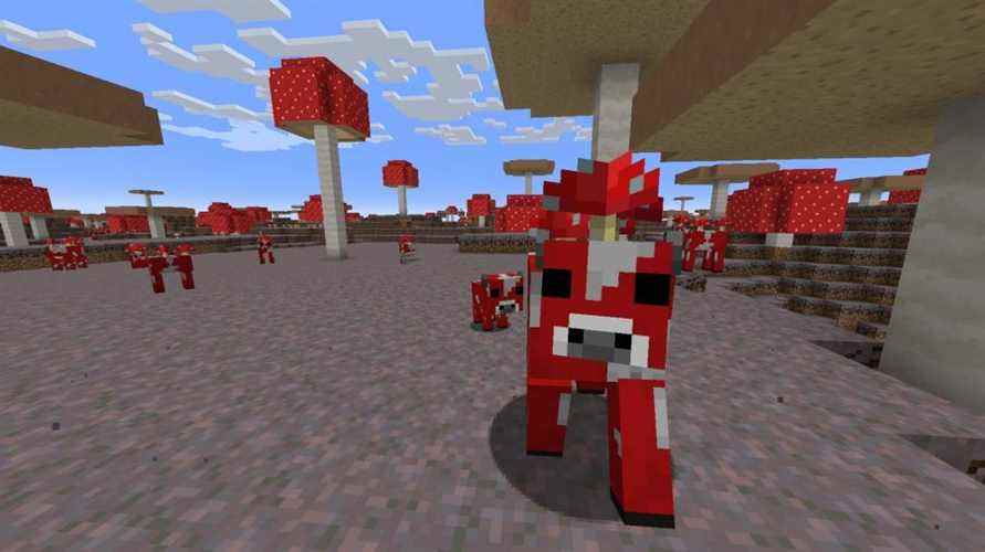Une vache rouge et blanche avec un champignon sur la tête marche sur un champ de champignons dans Minecraft