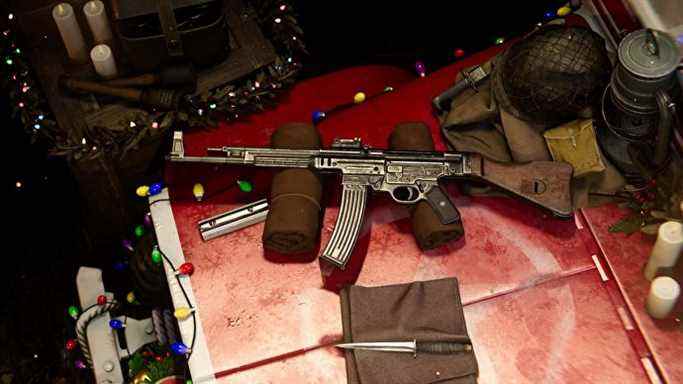 Vanguard STG44 dans le menu de chargement sur une caisse, entouré de décorations de Noël et de lumières festives