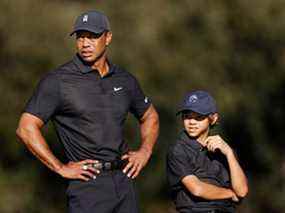 Tiger Woods et Charlie Woods assistent au Pro-Am avant le championnat PNC au Ritz Carlton Golf Club Grande Lakes à Orlando vendredi.