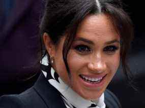 La duchesse britannique Meghan, duchesse de Sussex, réagit en partant après une table ronde de la Journée internationale de la femme au King's College de Londres, à Londres, en Grande-Bretagne, le 8 mars 2019.