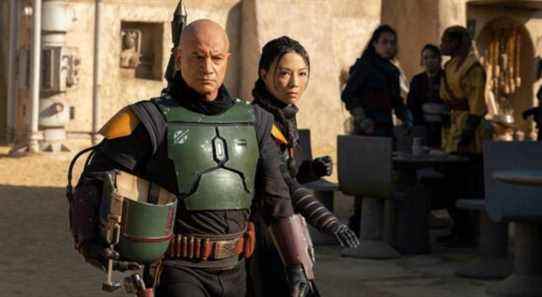 (L-R): Boba Fett (Temura Morrison) and Fennec Shand (Ming-Na Wen) in Lucasfilm's THE BOOK OF BOBA FETT, exclusively on Disney+. © 2021 Lucasfilm Ltd. & ™. All Rights Reserved.