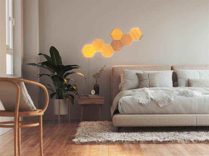 Les éléments Nanoleaf sont une pièce d'éclairage décorative conçue pour évoquer une forêt naturelle. 