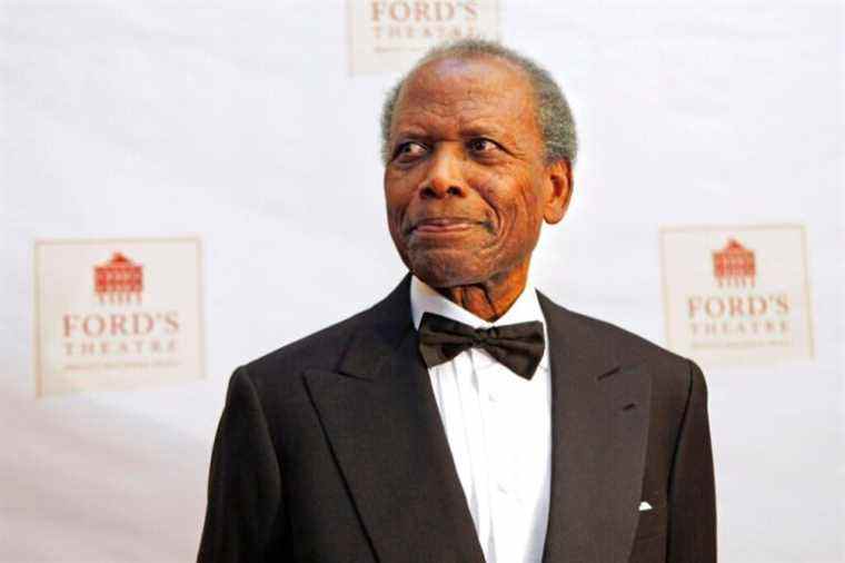 Sidney Poitier arrives at Ford's Theatre for its reopening and the bicentennial celebration of Lincoln's birth, in Washington, on Wednesday, Feb. 11, 2009. (AP Photo/Jacquelyn Martin)