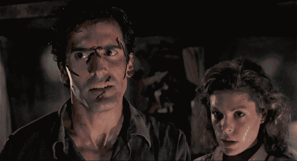 Bruce Campbell et Denise Bixler dans Evil Dead 2