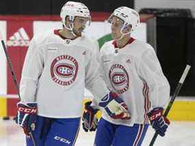 Les Canadiens de Montréal Brandon Baddock, à gauche, Jesse Ylonen lors du camp d'entraînement à Brossard en septembre 2021.