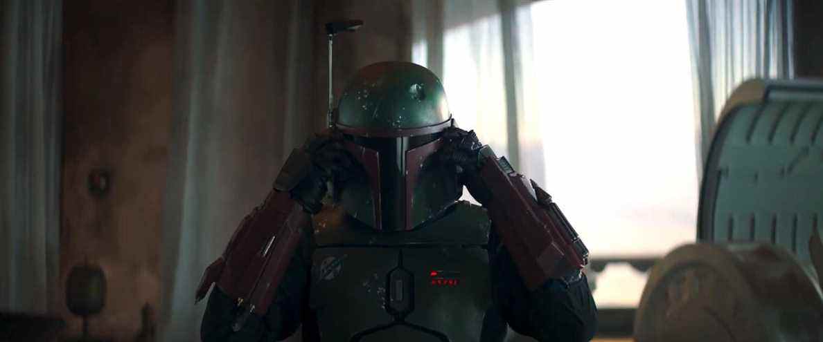 Boba Fett met son casque dans le Livre de Boba Fett