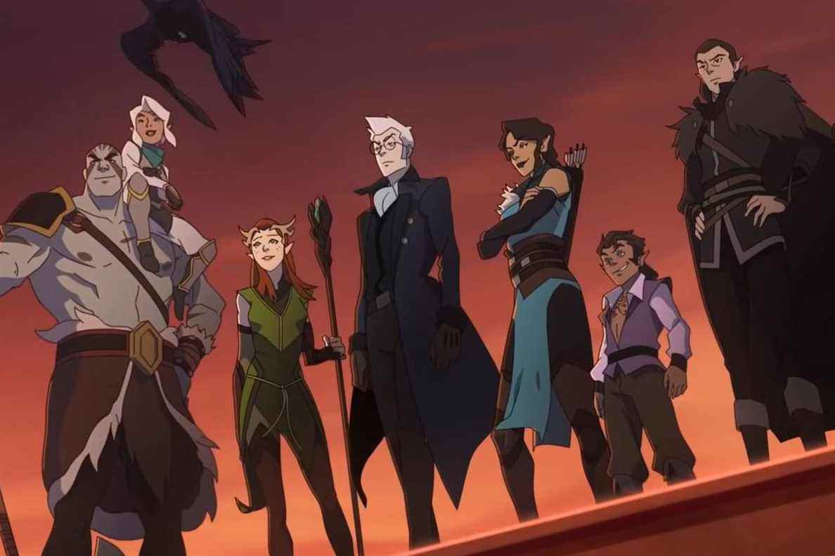 Un membre de Vox Machina lève une main coupée dans un bar.